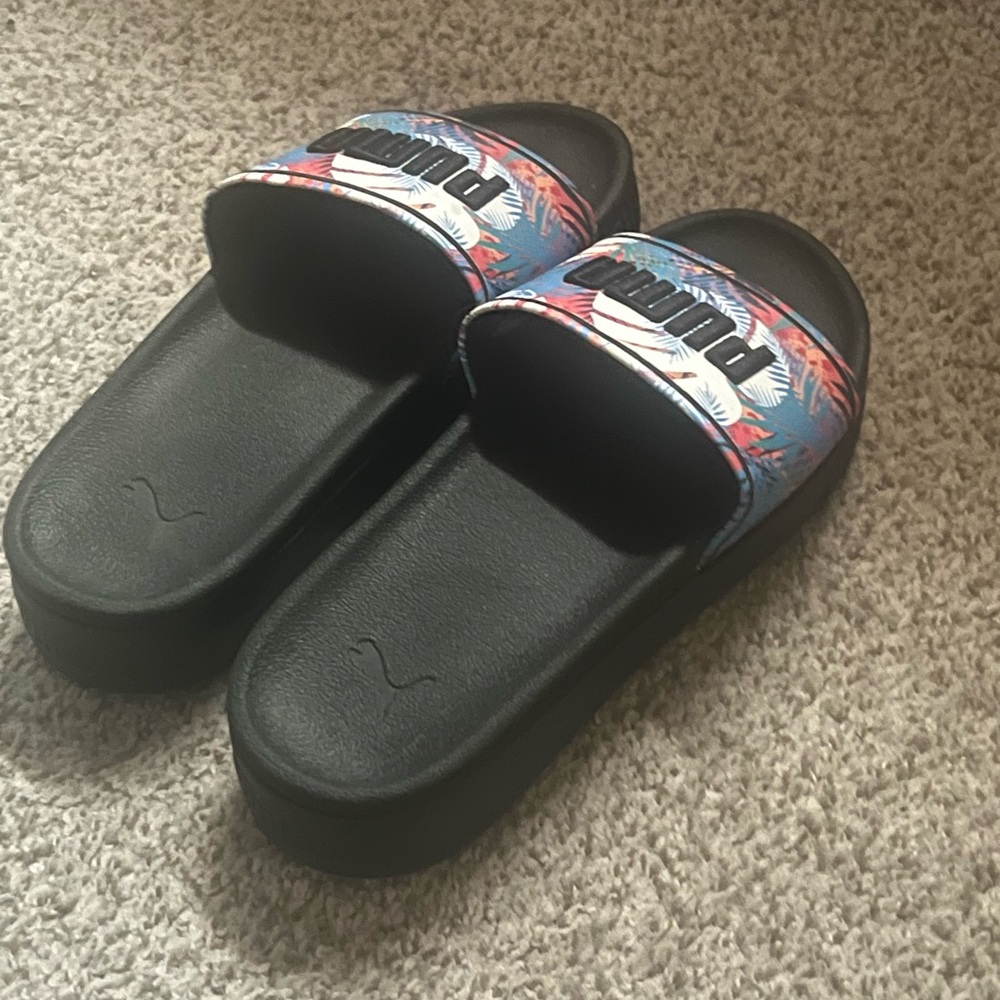 Puma Woman’s Black Slip-On Sandals